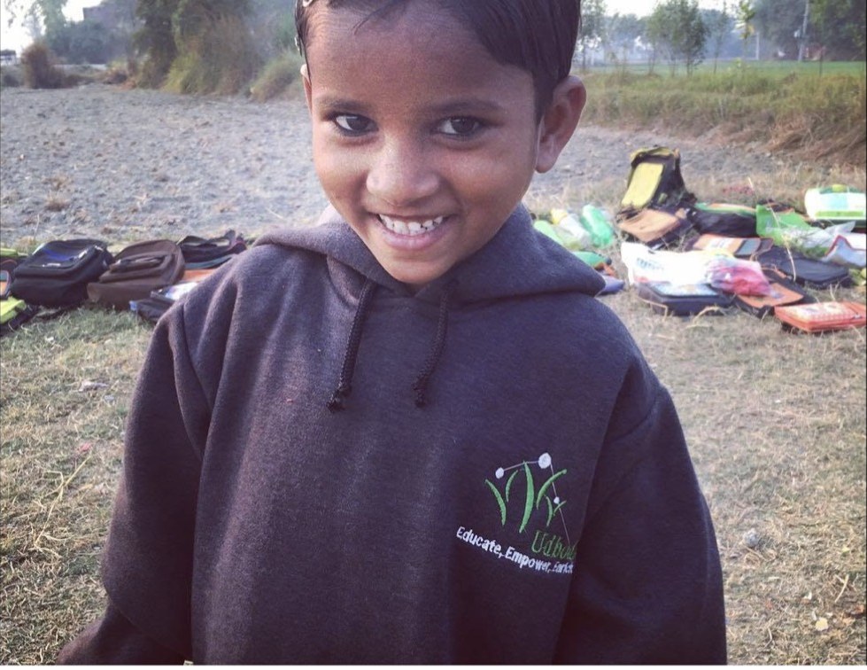 A boy in his Udbodh sweatshirt