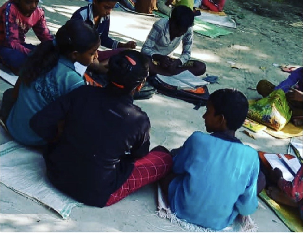 A fellow explaining a lesson one-on-one